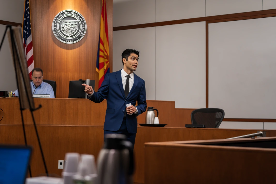 College of Law student arguing a case in front of a jury during a mock trail competition.